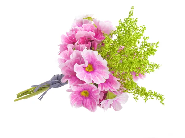 Uma prímula de primavera está em um buquê, fundo floral — Fotografia de Stock