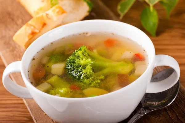 stock image Vegetable broccoli soup and carrots, bread with fennel