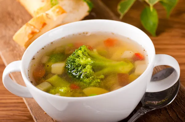 Vegetable broccoli soup and carrots, bread with fennel — Stock Photo, Image