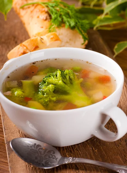 Vegetable broccoli soup and carrots, bread with fennel — Stock Photo, Image