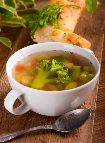 Vegetable broccoli soup and carrots, bread with fennel — Stock Photo, Image