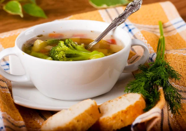 Vegetable broccoli soup and carrots, bread with fennel — Stock Photo, Image