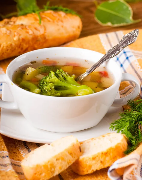 Vegetable broccoli soup and carrots, bread with fennel — Stock Photo, Image