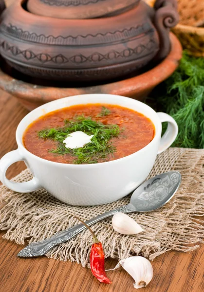 Borsch, soup from a beet and cabbage with tomato sauce. — Stock Photo, Image