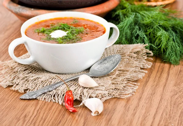 Borsch, soup from a beet and cabbage with tomato sauce. — Stock Photo, Image