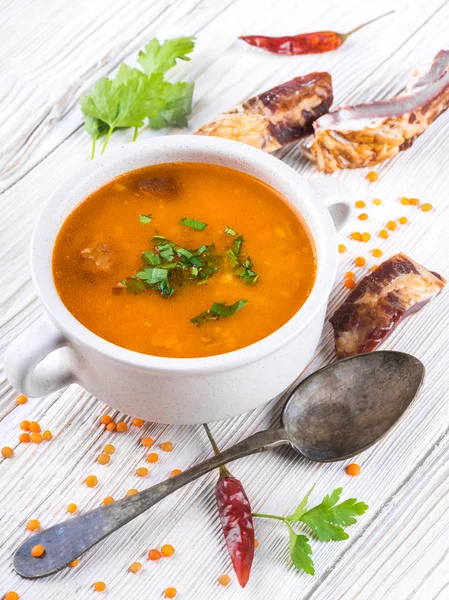 Soup on a wooden table — Stock Photo, Image