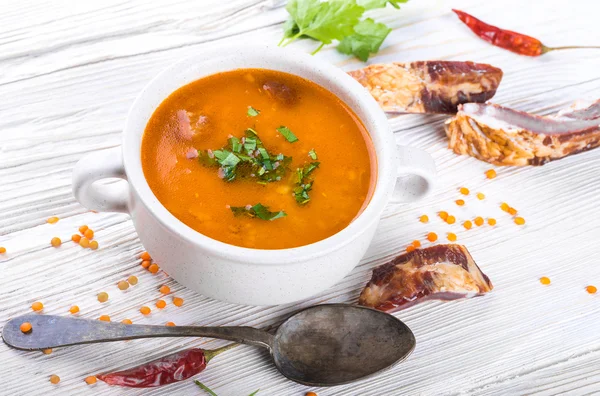 Soup on a wooden table — Stock Photo, Image