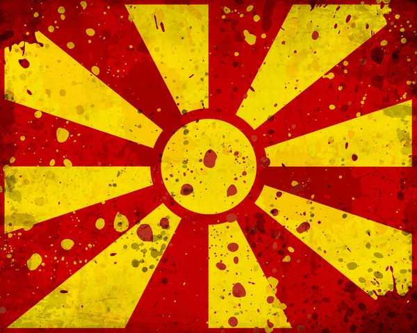 Grunge Macedonië vlag met vlekken — Stockfoto