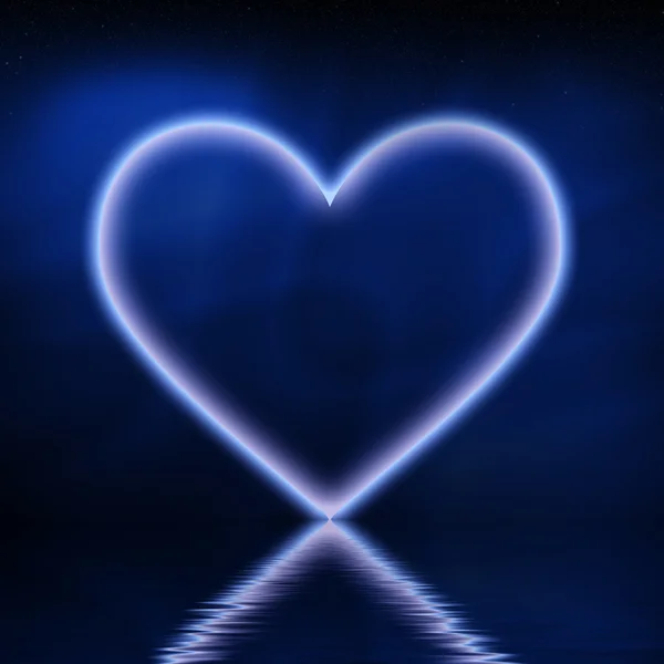 Cuore su sfondo blu — Foto Stock