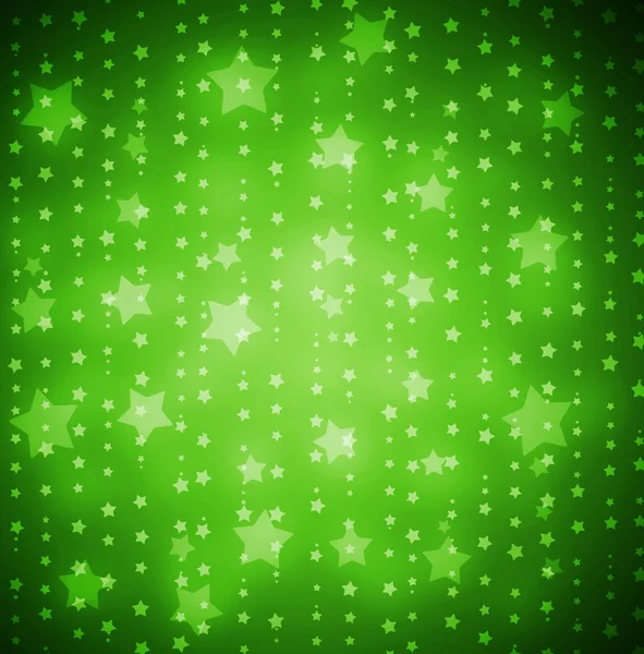 Christmas stars on green background — Stock Photo, Image