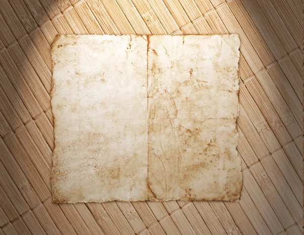 Old paper on the wood background — Stock Photo, Image