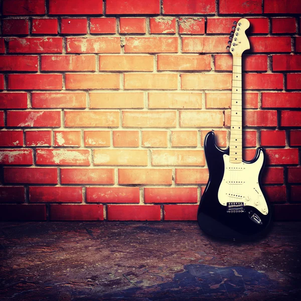 Elektrická kytara v místnosti — Stock fotografie