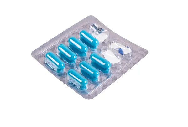 Confezione aperta di pillole isolate su sfondo bianco — Foto Stock