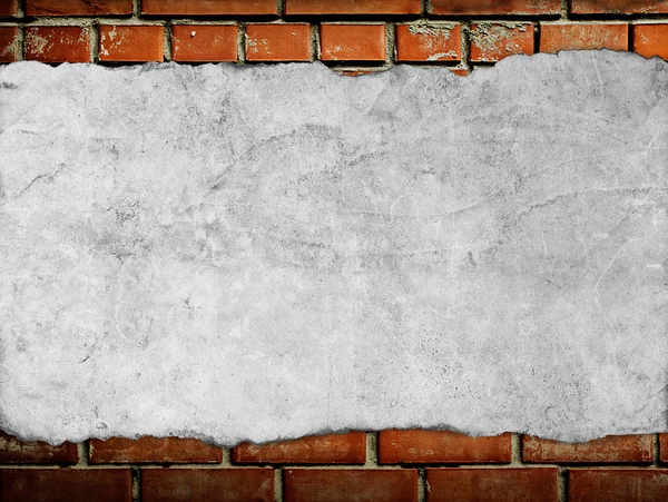 Old paper on brickwall — Stock Photo, Image