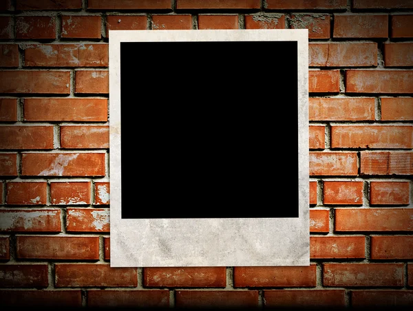 Photo frame on the brick wall — Stock Photo, Image