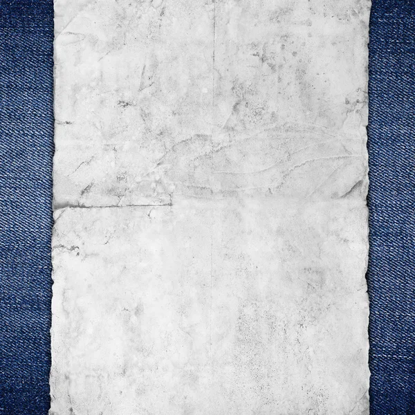 Vintage paper on blue jeans background — Stock Photo, Image