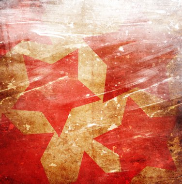 turuncu bir arka plan üzerinde kırmızı yıldız