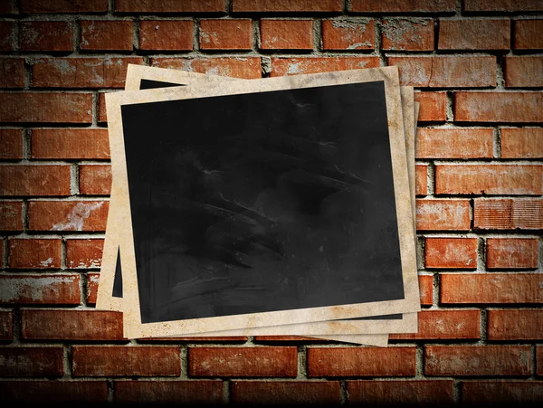 Photo frame on the brick wall — Stock Photo, Image