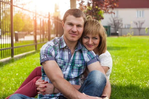 Young couple relaxing in park Stock Picture