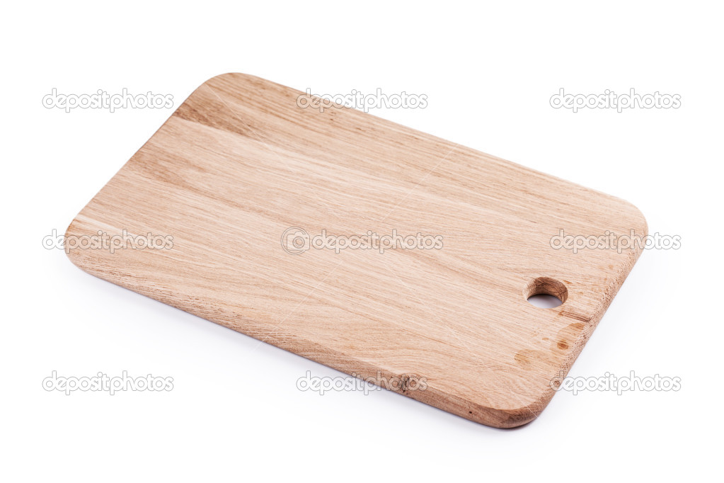 clean oak cutting board isolated on white