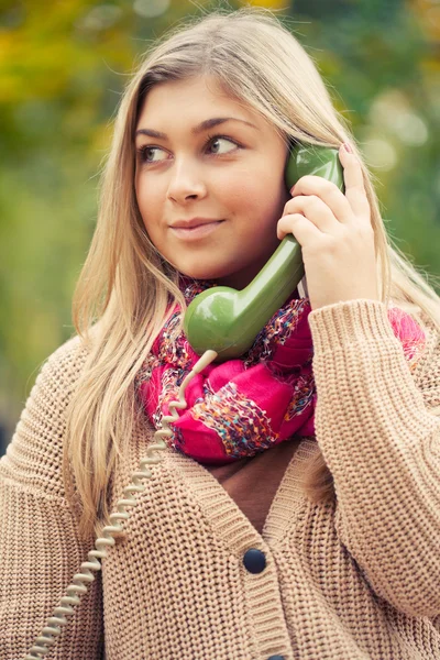 Young blond woman calling — Stock Photo, Image