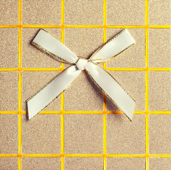 Top view of elegant gift box with bow — Stock Photo, Image