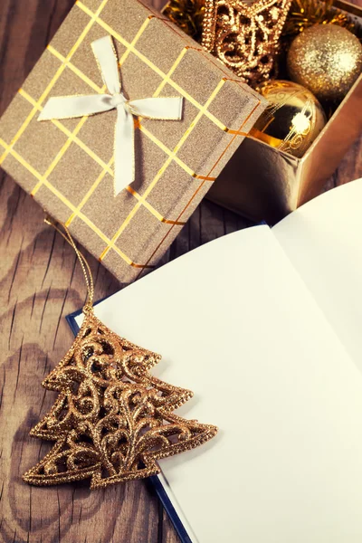 Open book with christmas decoration — Stock Photo, Image