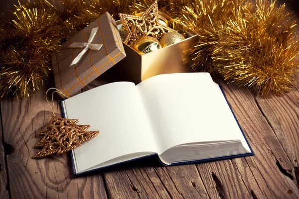 Open book with christmas decoration — Stock Photo, Image