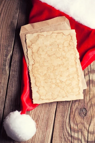 Carta vintage con cappello di Babbo Natale — Foto Stock