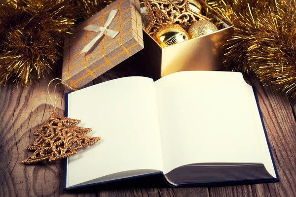 Open book with christmas decoration — Stock Photo, Image