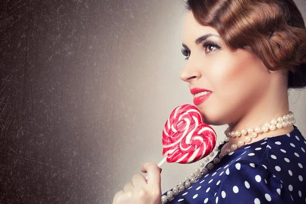 Woman with big lollipop — Stock Photo, Image