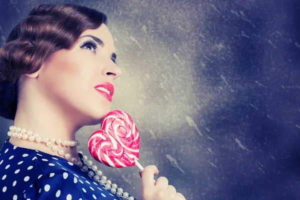 Woman with big lollipop — Stock Photo, Image