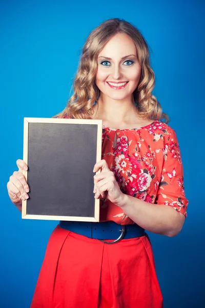 Woman with blackboard — Stock Photo, Image