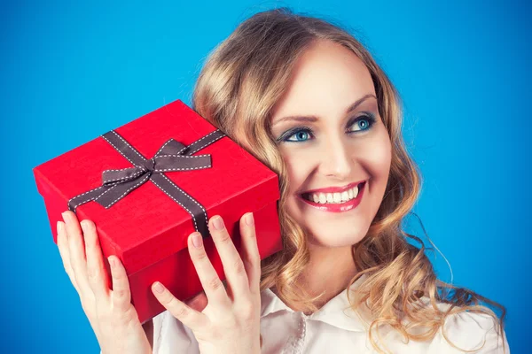 Woman with a gift box — Stock Photo, Image