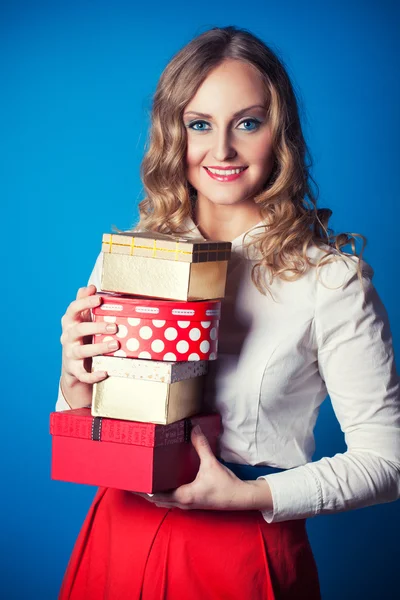 Woman with a gift boxes — Stock Photo, Image