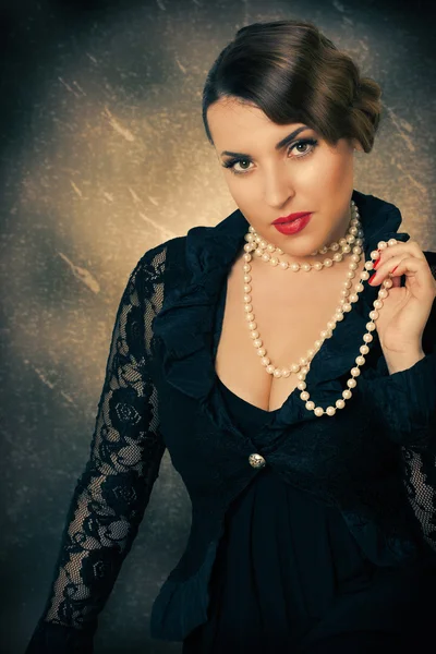 Woman with pearls Stock Image
