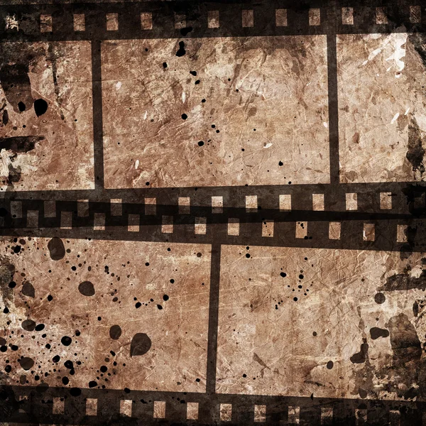 Grunge background with film stripe — Stock Photo, Image