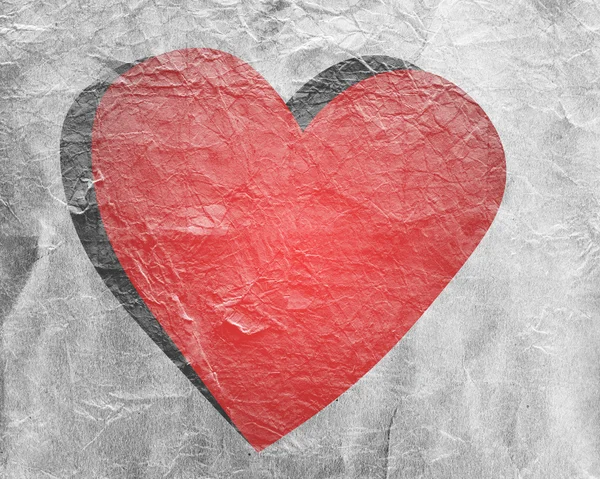 Rött hjärta på papper — Stockfoto