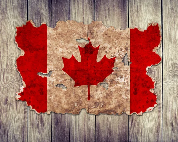 Canada flag in form of torn vintage paper — Stock Photo, Image