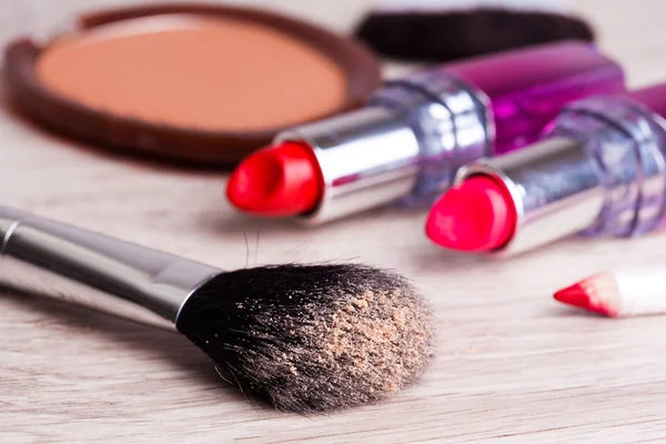 Various Cosmetics on wooden table — Stock Photo, Image
