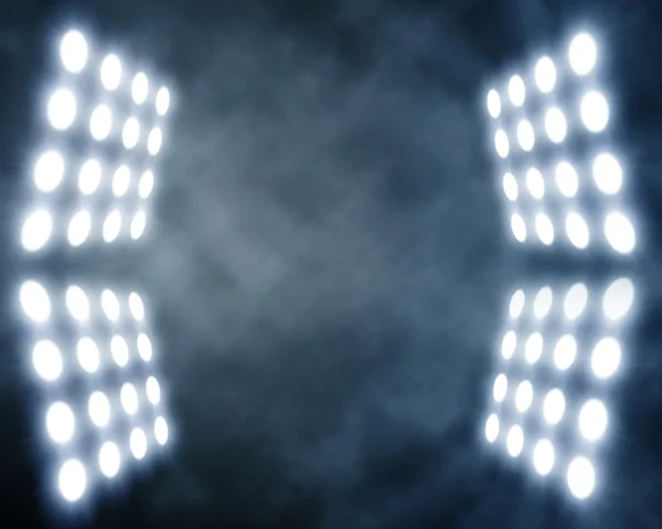 Stage spotlights in artificial smoke — Stock Photo, Image