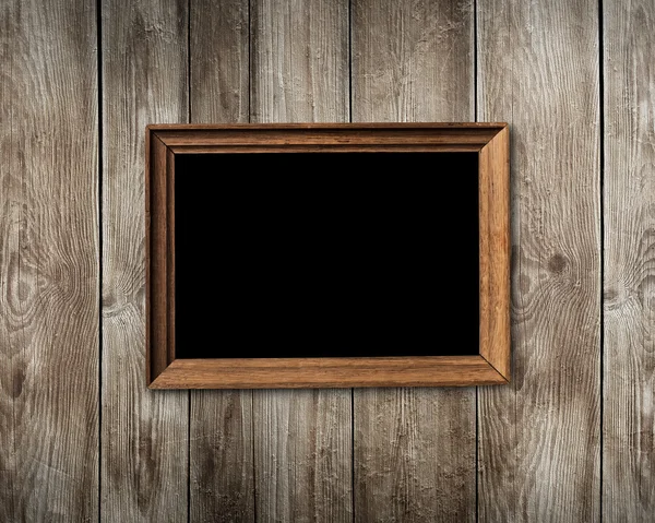 Vintage wooden frame on wood background — Stock Photo, Image