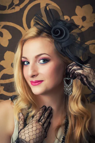 Woman trying earrings — Stock Photo, Image