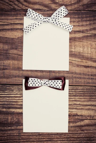 Paper sheets with bows — Stock Photo, Image