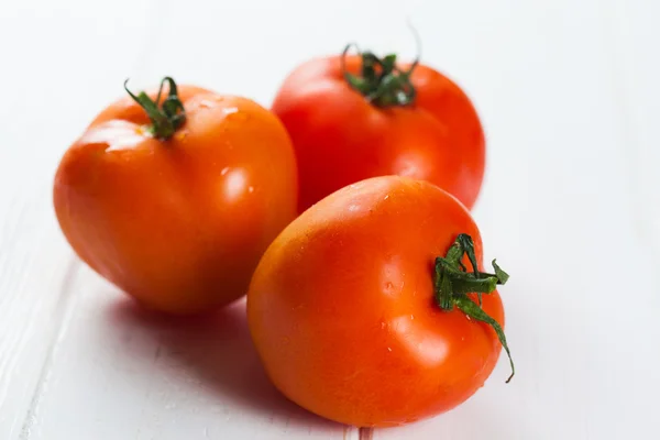 Tomatoes on  table — Stock Photo, Image