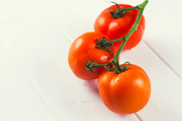 Tomatoes on  table — Stock Photo, Image