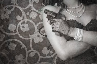 Woman holding a gun clipart