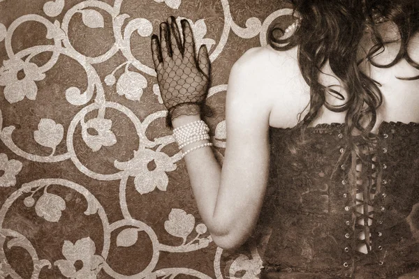 Woman wearing black corset and pearls — Stock Photo, Image