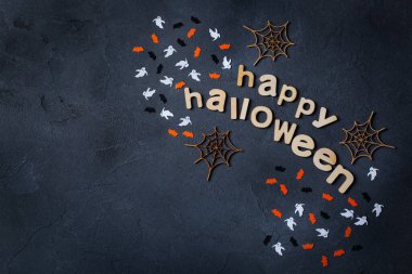 Cadılar Bayramı tebrik kartı hayaletler, örümcek ağı, balkabağı ve yarasalar