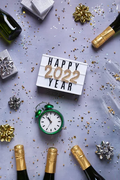 Happy New Year greeting card, 2022 with champagne, confetti — Stockfoto